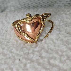 Gold & Copper Heart-Shaped bracelet.